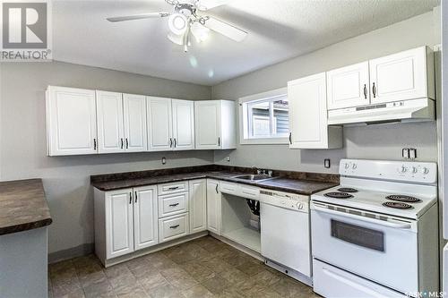 1651 103Rd Street, North Battleford, SK - Indoor Photo Showing Kitchen With Double Sink