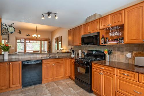 B - 1003 Mountain View Road, Rossland, BC - Indoor Photo Showing Kitchen With Double Sink