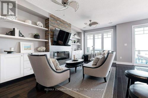 8 Pierre Trudeau Lane, Grimsby, ON - Indoor Photo Showing Living Room With Fireplace