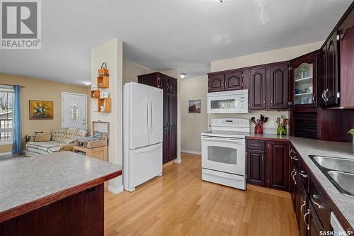 116 4Th Street, Birch Hills, SK - Indoor Photo Showing Kitchen With Double Sink