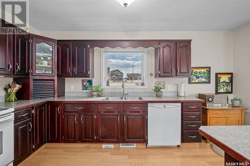 116 4Th Street, Birch Hills, SK - Indoor Photo Showing Kitchen With Double Sink