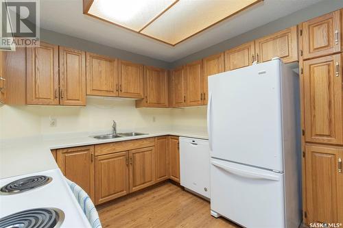 106 3220 33Rd Street W, Saskatoon, SK - Indoor Photo Showing Kitchen With Double Sink