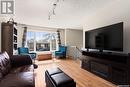 7307 Blakeney Drive, Regina, SK  - Indoor Photo Showing Living Room With Fireplace 