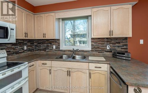30 Amberview Dr, Georgina, ON - Indoor Photo Showing Kitchen With Double Sink