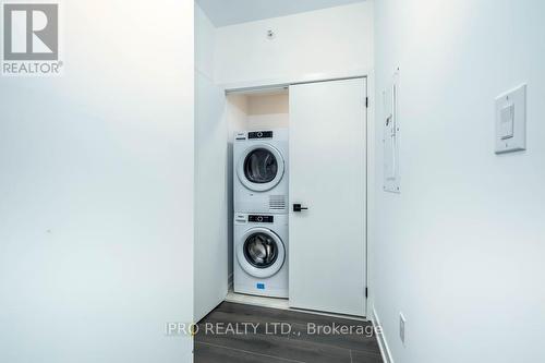 504 - 4 Spice Way, Barrie, ON - Indoor Photo Showing Laundry Room