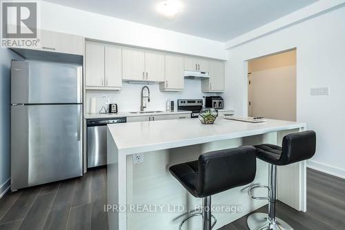 504 - 4 Spice Way, Barrie, ON - Indoor Photo Showing Kitchen With Stainless Steel Kitchen With Upgraded Kitchen