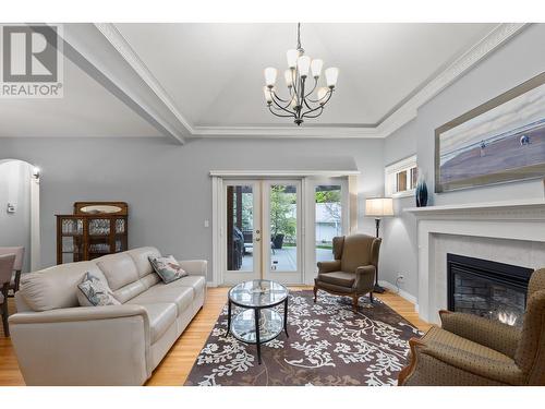 860 Small Court, Kelowna, BC - Indoor Photo Showing Living Room With Fireplace