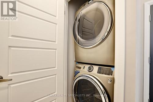 101 - 3265 Carding Mill Trail, Oakville, ON - Indoor Photo Showing Laundry Room
