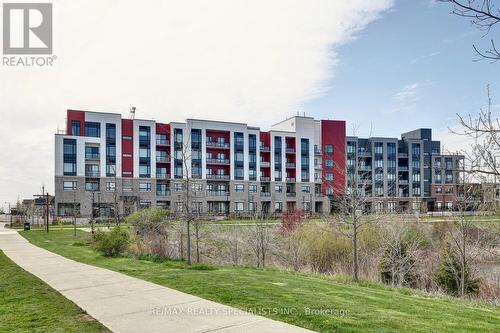 101 - 3265 Carding Mill Trail, Oakville, ON - Outdoor With Facade