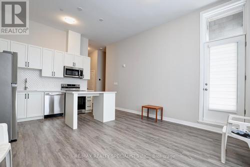 #101 -3265 Carding Mill Tr, Oakville, ON - Indoor Photo Showing Kitchen With Stainless Steel Kitchen