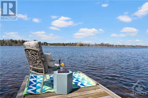 Can you imaging yourself getting home from a brutal day at the office and coming down here and sitting here to decompress... truly heaven!! - 3756 Mapleshore Drive, Kemptville, ON - Outdoor With Body Of Water With View