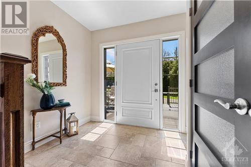 Enter the home through this gorgeous welcoming foyer with beautiful natural light beaming in. - 3756 Mapleshore Drive, Kemptville, ON - Indoor Photo Showing Other Room