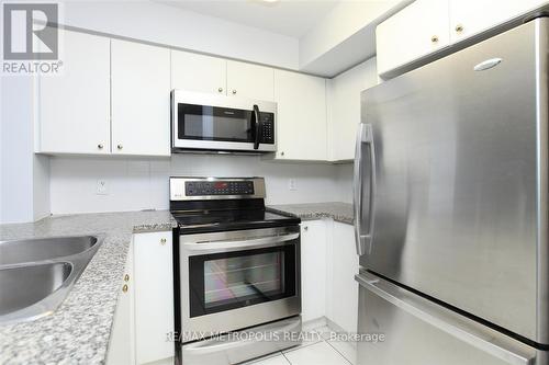 #321 -51 Lower Simcoe St, Toronto, ON - Indoor Photo Showing Kitchen With Double Sink