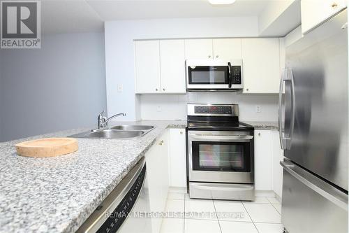 #321 -51 Lower Simcoe St, Toronto, ON - Indoor Photo Showing Kitchen With Double Sink