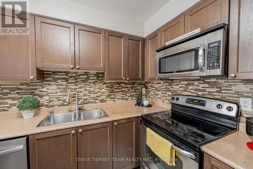 65 Tempo Way, Whitby, ON - Indoor Photo Showing Kitchen With Stainless Steel Kitchen With Double Sink With Upgraded Kitchen