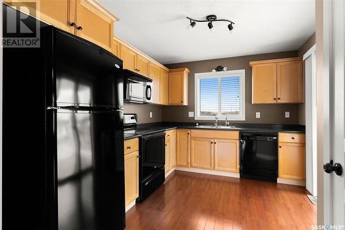 66 4101 Preston Crescent, Regina, SK - Indoor Photo Showing Kitchen With Double Sink