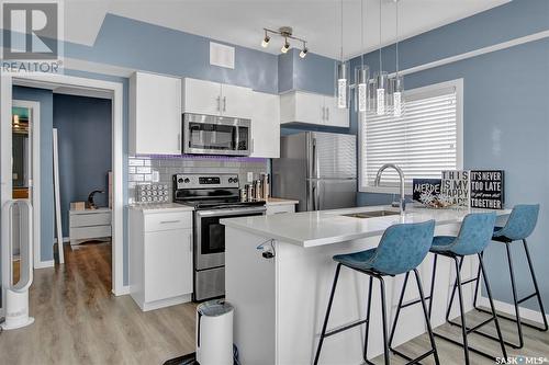 204A 3351 Green Poppy Street, Regina, SK - Indoor Photo Showing Kitchen With Upgraded Kitchen