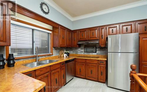 128 Gilley Rd N, Toronto, ON - Indoor Photo Showing Kitchen With Double Sink