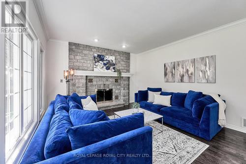 #7 - 25 Manor Park Crescent, Guelph, ON - Indoor Photo Showing Living Room With Fireplace