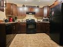 112 825 Gladstone Street E, Swift Current, SK  - Indoor Photo Showing Kitchen 