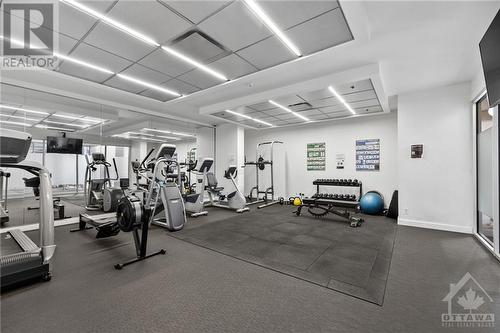 The large gym is on the same floor as the unit. - 340 Mcleod Street Unit#105, Ottawa, ON - Indoor Photo Showing Gym Room