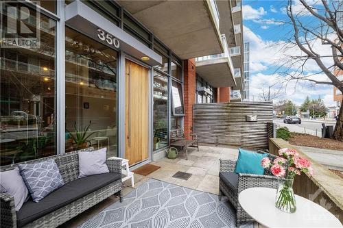 The private patio off McLeod, great for people watching and hanging out with friends. - 340 Mcleod Street Unit#105, Ottawa, ON - Outdoor With Deck Patio Veranda With Exterior