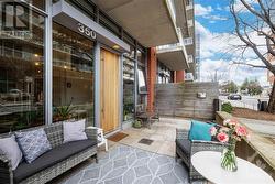 The private patio off McLeod, great for people watching and hanging out with friends. - 