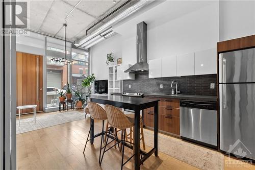 Exposed duct work for a modern industrial feel. - 340 Mcleod Street Unit#105, Ottawa, ON - Indoor Photo Showing Kitchen