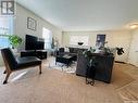 42 1275 South Railway Street E, Swift Current, SK  - Indoor Photo Showing Living Room 