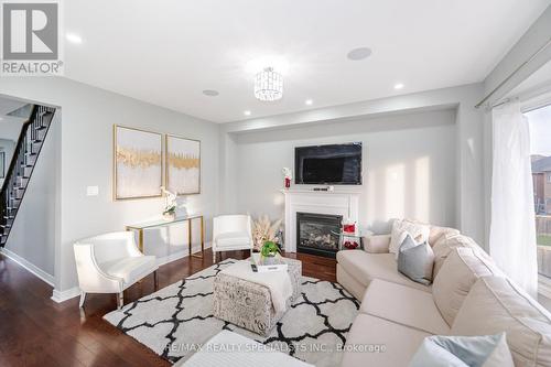 16 Torraville St, Brampton, ON - Indoor Photo Showing Living Room With Fireplace