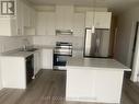 #Main -7426 Parkside Dr E, Niagara Falls, ON  - Indoor Photo Showing Kitchen With Stainless Steel Kitchen With Double Sink 