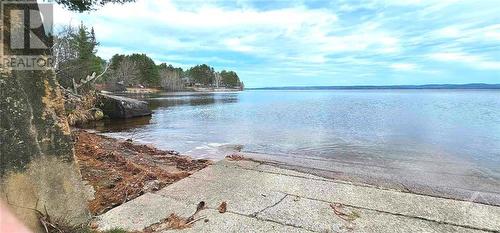 4 minutes down the road is this boat launch, and if you want to get onto Golden Lake, that launch is only 15 minutes.  The fishing is great, Northern pike, Walleye, Largemouth bass, Lake trout, an - 48 Sunrise Road, Killaloe, ON - Outdoor With Body Of Water With View