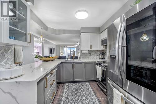 #409 -1000 The Esplanade  N, Pickering, ON - Indoor Photo Showing Kitchen With Upgraded Kitchen