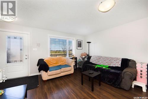 102 210 Rajput Way, Saskatoon, SK - Indoor Photo Showing Living Room