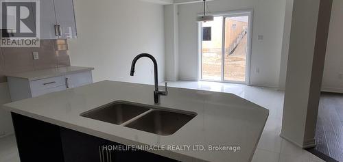 69 George Brier Dr E, Brant, ON - Indoor Photo Showing Kitchen With Double Sink