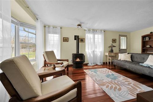 36 Nature Line, Lowbanks, ON - Indoor Photo Showing Living Room With Fireplace