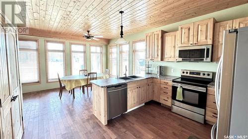 243 Ruby Drive, Hitchcock Bay, SK - Indoor Photo Showing Kitchen With Double Sink