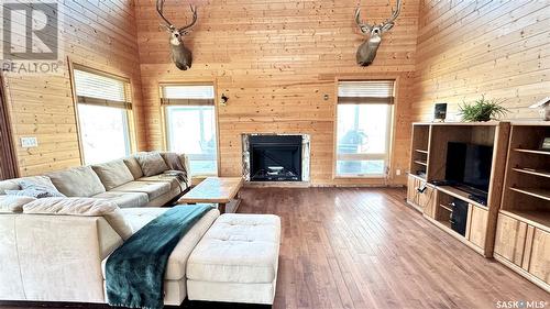 243 Ruby Drive, Hitchcock Bay, SK - Indoor Photo Showing Living Room With Fireplace