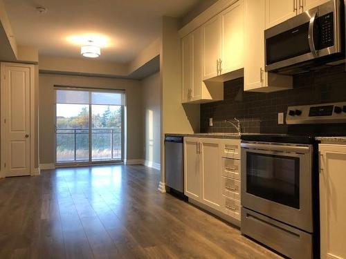 4040 Upper Middle Road|Unit #215, Burlington, ON - Indoor Photo Showing Kitchen With Stainless Steel Kitchen