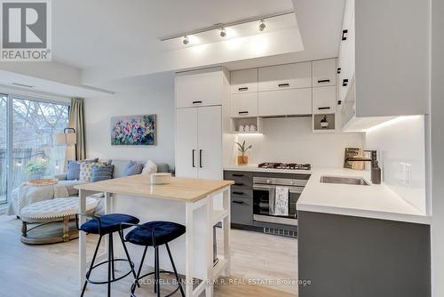 #210 -1888 Queen St E, Toronto, ON - Indoor Photo Showing Kitchen With Upgraded Kitchen