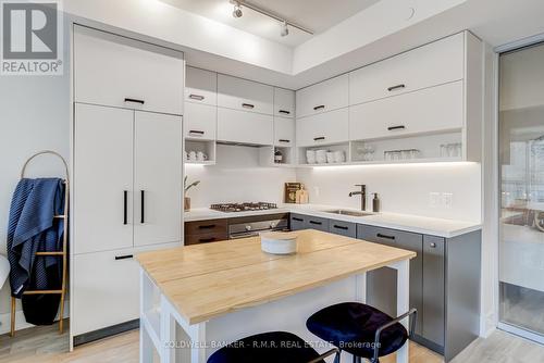 210 - 1888 Queen Street E, Toronto, ON - Indoor Photo Showing Kitchen With Upgraded Kitchen