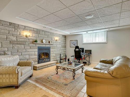 Family room - 1115 Rue Des Anciens, Prévost, QC - Indoor With Fireplace