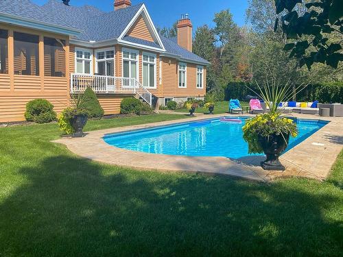 Backyard - 1115 Rue Des Anciens, Prévost, QC - Outdoor With In Ground Pool