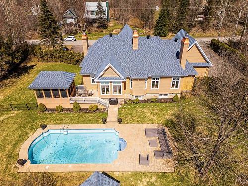 Aerial photo - 1115 Rue Des Anciens, Prévost, QC - Outdoor With In Ground Pool
