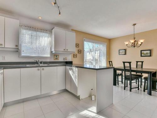 Dwelling - 8  - 12 Rue Félix-Antoine-Savard, Blainville, QC - Indoor Photo Showing Kitchen With Double Sink