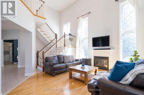 28 Camelot Sq, Barrie, ON - Indoor Photo Showing Living Room With Fireplace