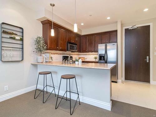 205-1335 Bear Mountain Pkwy, Langford, BC - Indoor Photo Showing Kitchen With Upgraded Kitchen