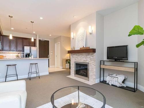 205-1335 Bear Mountain Pkwy, Langford, BC - Indoor With Fireplace
