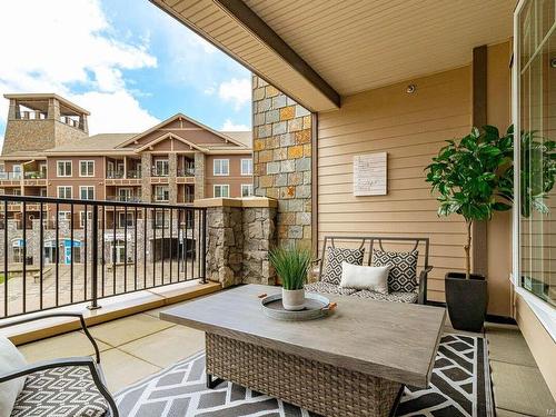 205-1335 Bear Mountain Pkwy, Langford, BC - Outdoor With Balcony With Exterior
