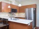 202-2380 Brethour Ave, Sidney, BC  - Indoor Photo Showing Kitchen With Stainless Steel Kitchen With Double Sink 